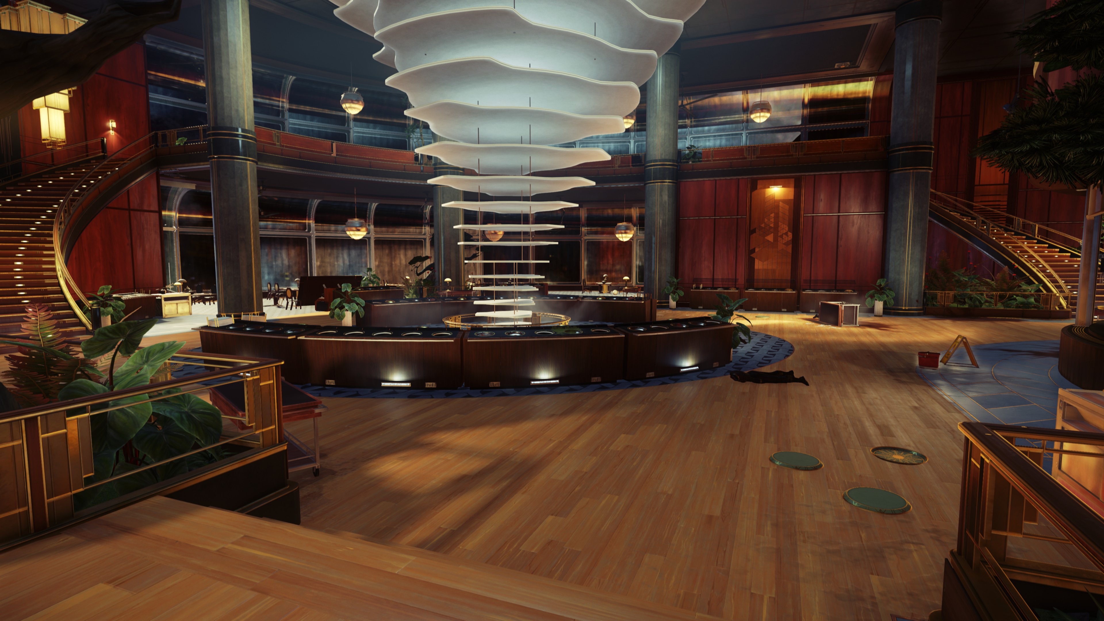 A screenshot from Prey(2017) showing a dimly lit corridor with pipes on the right side. At the end there is a well lit area.